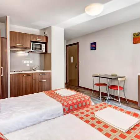 Vacancéole - Résidence Grand Massif Apartahotel